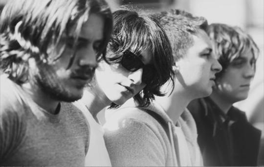 print a poster - Four Men Sitting In Line - arcticmonkeysalexturner.bmp