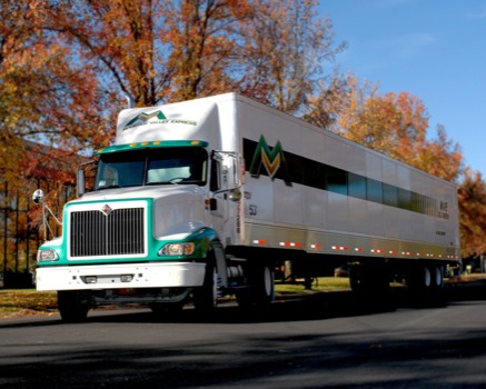 print a poster - Tracker Trailer Truck Fall Leaves Roadway - Newtruckandtrailer.png