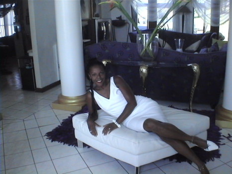 posterbrains - Woman In White Dress Lounging On White Ottoman - 5399751.jpg