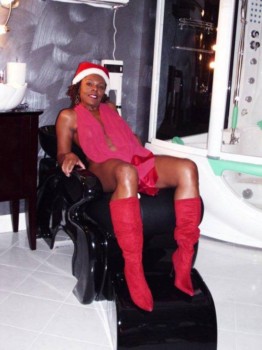posterbrains - Woman In Santa Hat And Red Boots On Recliner - DSCI0042.jpg