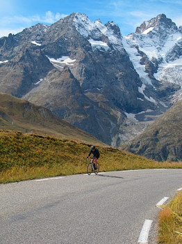 create posters from pictures - Bicyclist On Road In Front Of Snowy Mountains - IMG_1920.tif