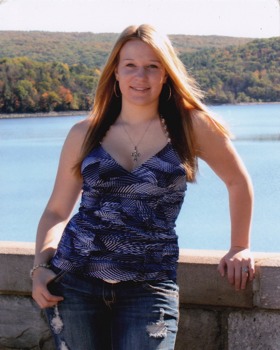 photo - Woman Standing Brick Wall Lake - camille.jpg