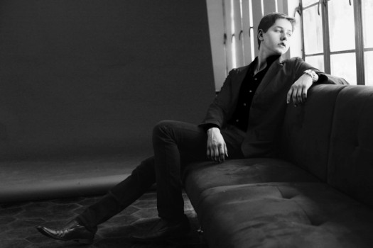 print a poster - Man Sitting On Sofa - Image_2__Black_and_white_couch_24X36_1.jpg