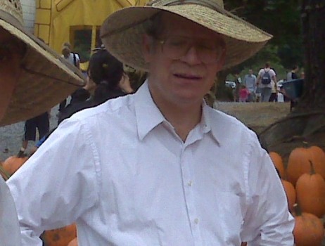 print a poster - Man White Shirt Straw Hat Pumpkins - stevegold.jpg