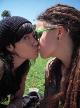 blow up pictures in beaumont tx - Women Kissing Sitting Grass - whittttnrachhhh.jpg